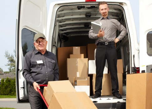 Moving boxes and furniture in a Chiswick property
