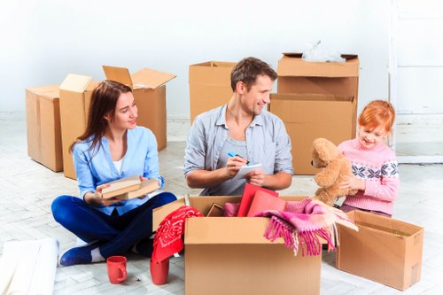 Professional movers loading household items for a Chiswick relocation