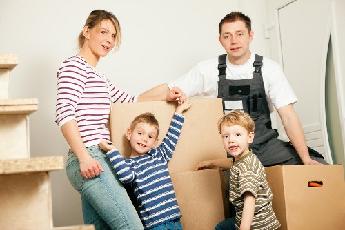 Removal team loading household items for transport
