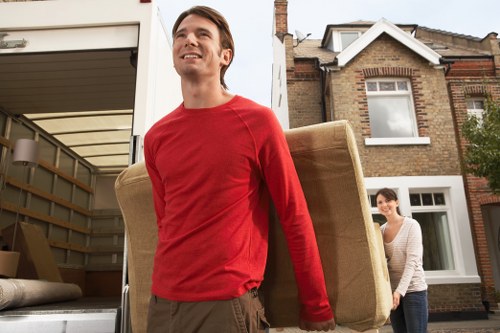 Loading furniture into a van for a local Chiswick move
