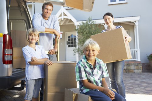 Professional movers loading student belongings in Chiswick