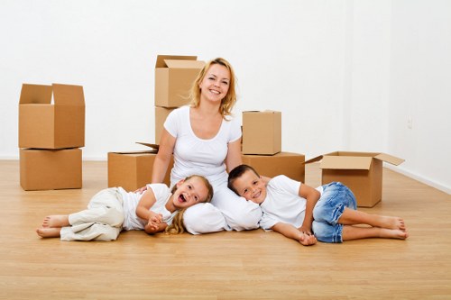 Professional office movers setting up a new workspace in Chiswick