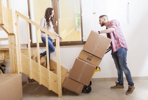 Furniture being moved carefully near a Chiswick apartment building