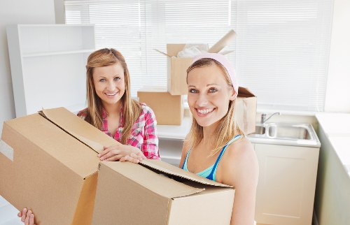 Business furniture and equipment being prepared for relocation in Chiswick