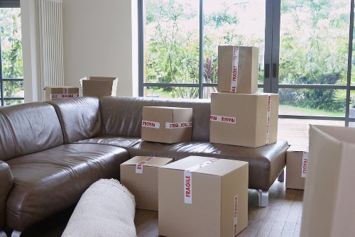 Fragile items being securely wrapped during packing services in Chiswick