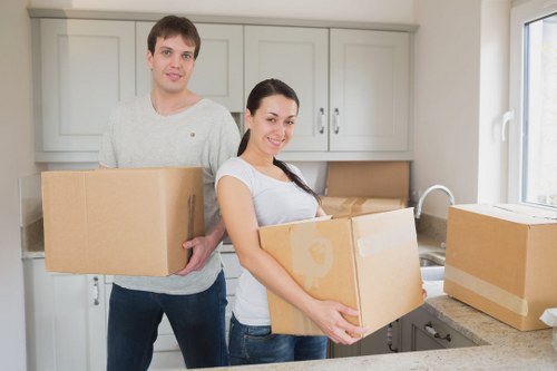 Packed office boxes and equipment prepared for relocation